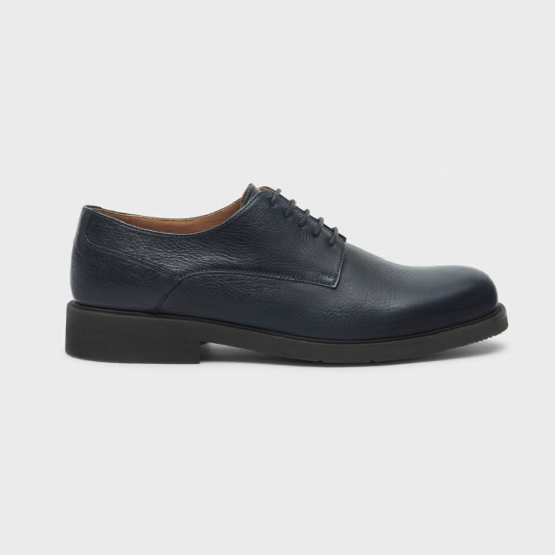 Zapatos de piel con suela resistente y acabado elegante para hombre®