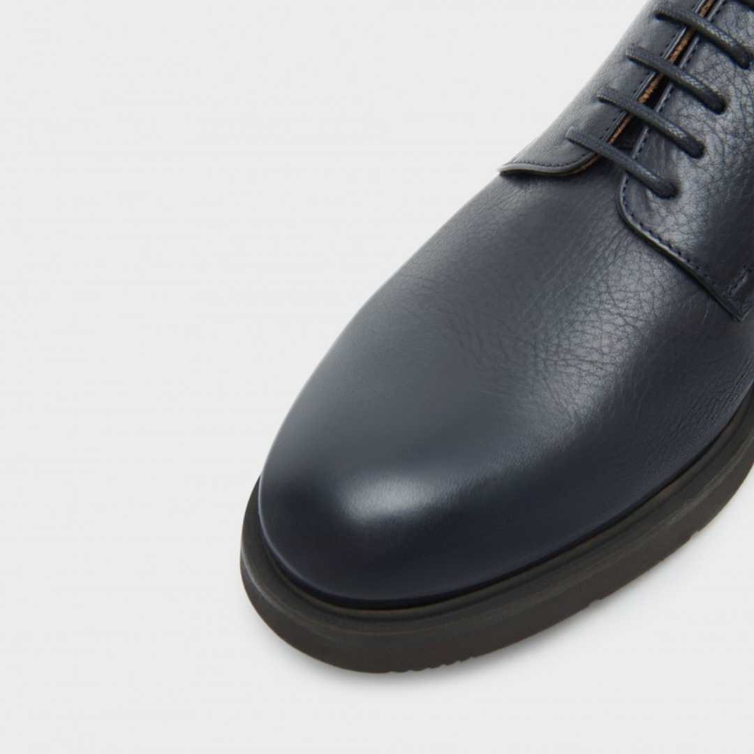 Zapatos de piel con suela resistente y acabado elegante para hombre®