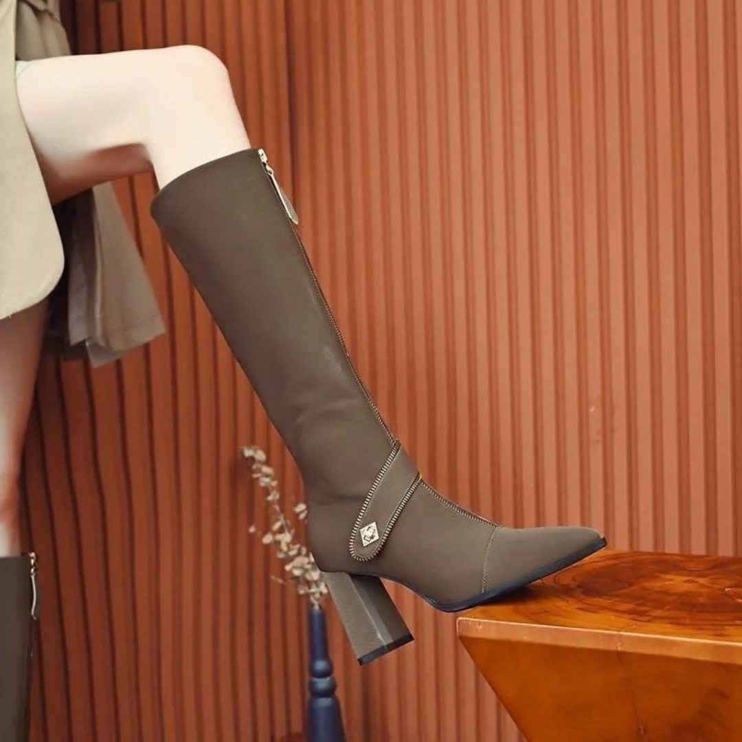 Botas altas de mujer de cuero con cremallera frontal y tacón grueso